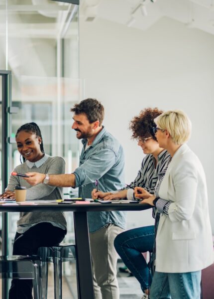 Diverse,Employees,Gathered,In,The,Office,Having,Fun,During,Brainstorming